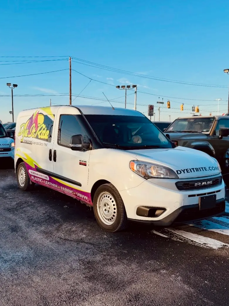 Dye It Rite mobile repair van parked on a dealership lot