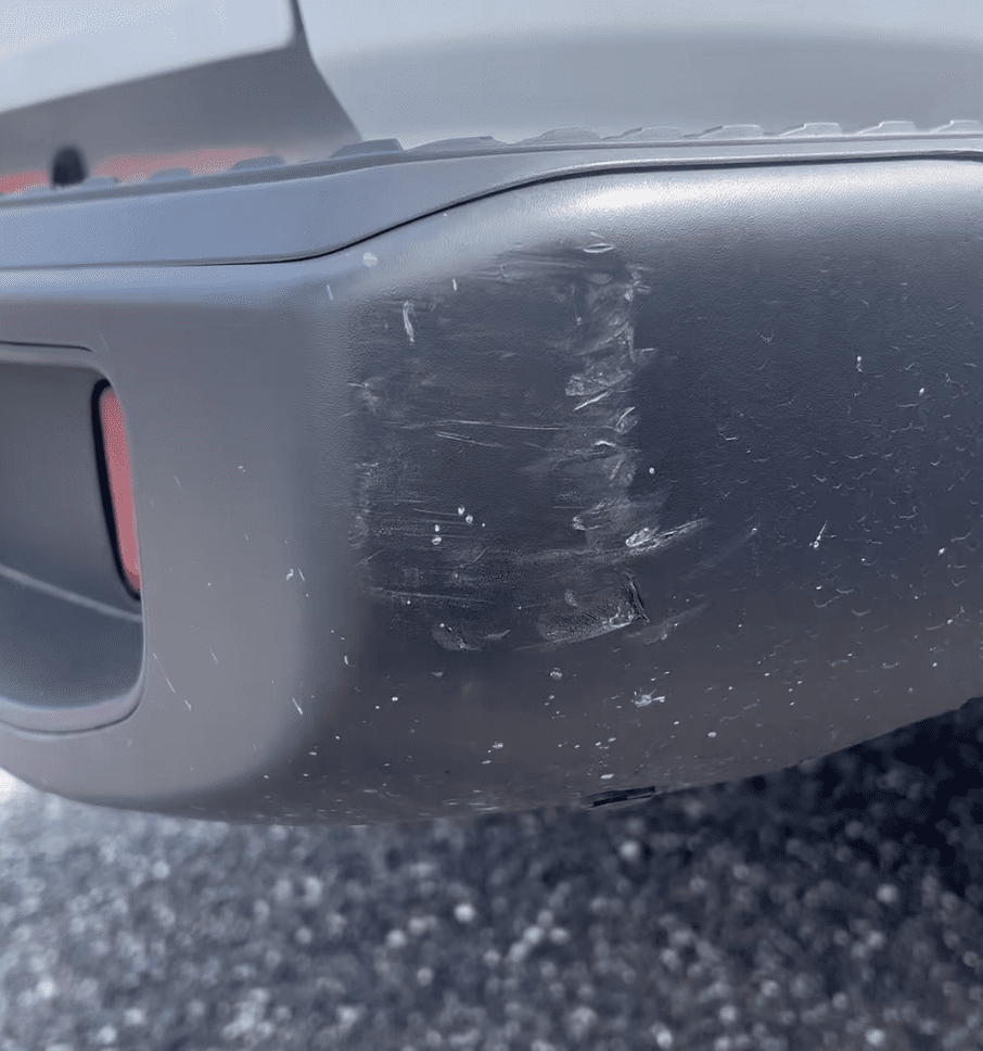 Faded exterior plastic trim before auction reconditioning