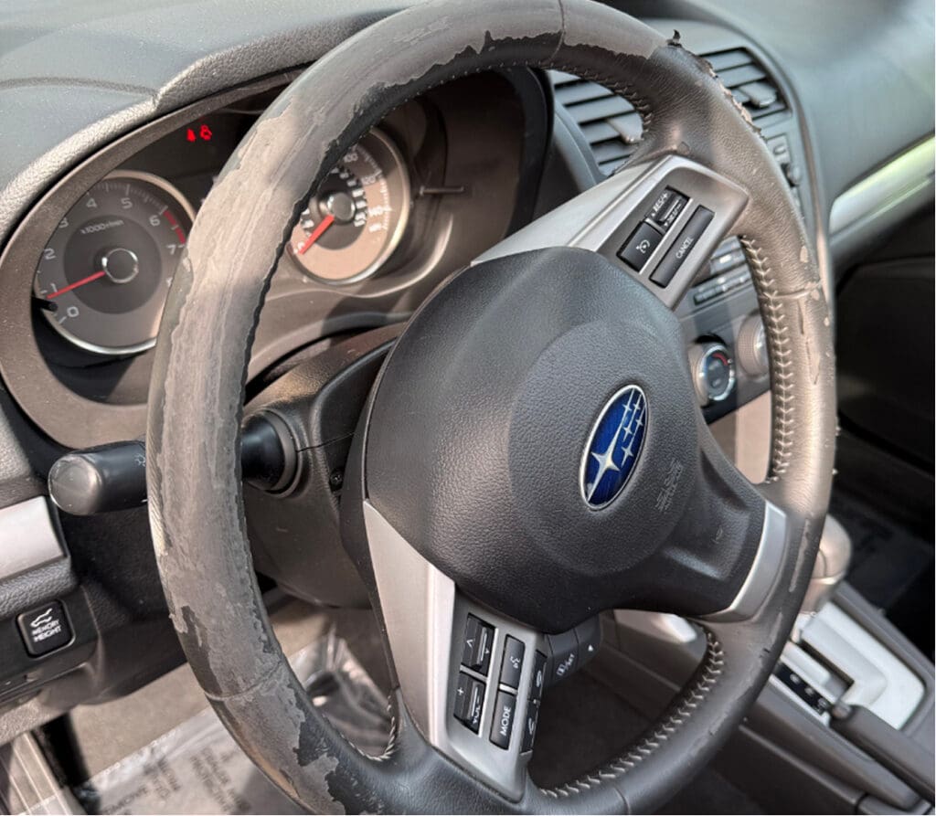 Interior scuff damage before insurance claim repair