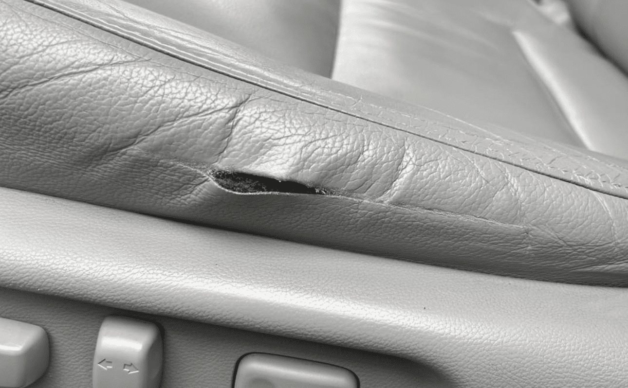 Damaged center console before mobile interior reconditioning