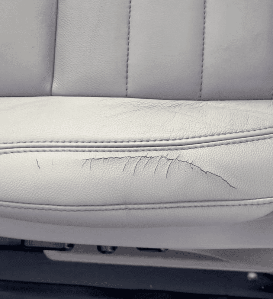 Damaged armrest before auto auction reconditioning service