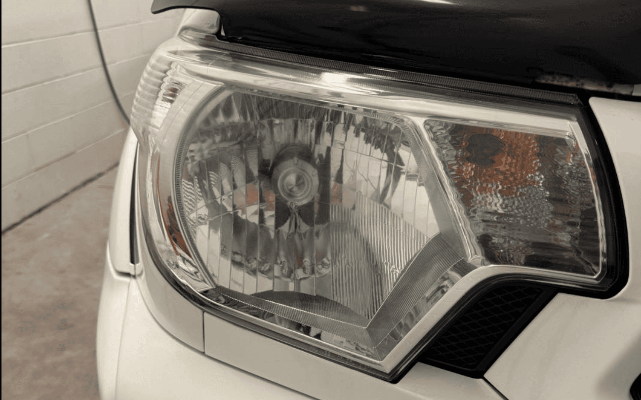 Crystal clear headlight after restoration and detailing in Allentown PA