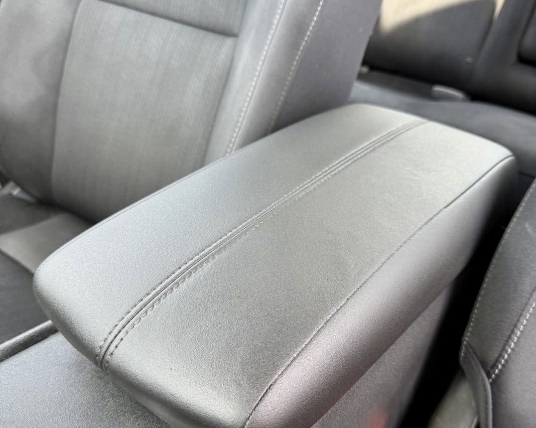 Interior detailing and upholstery repair on a vehicle console in Allentown