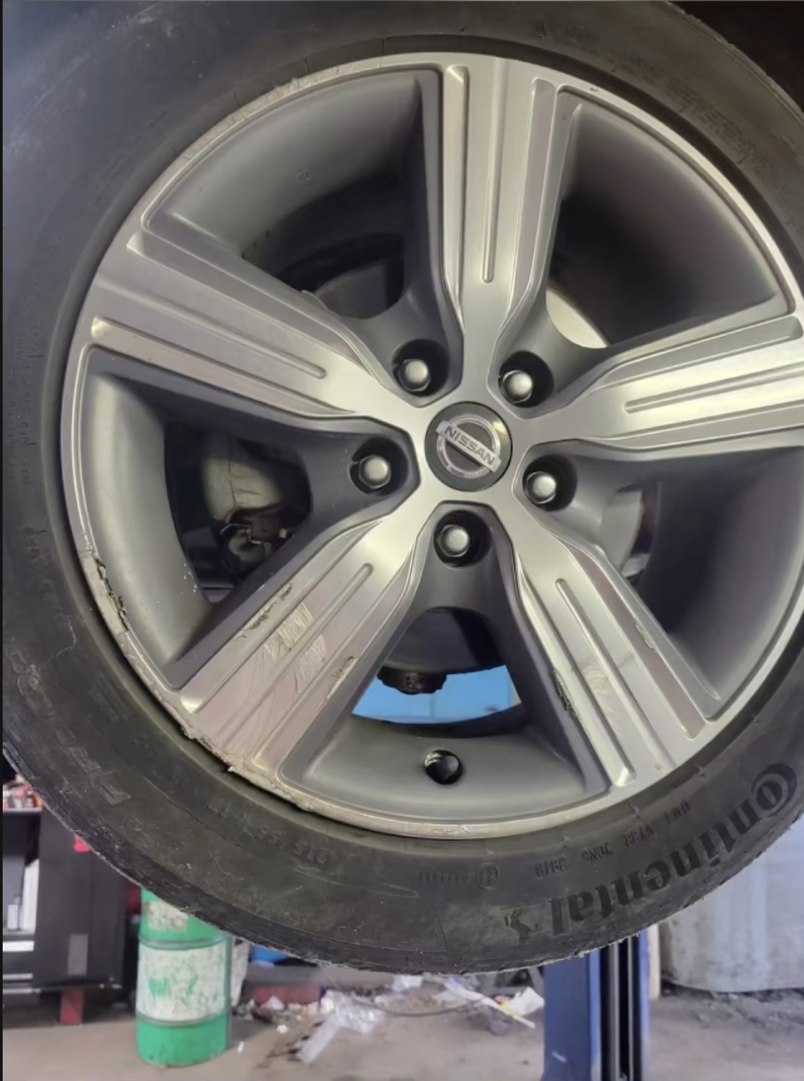 Alloy wheel curb rash before rim repair in York PA