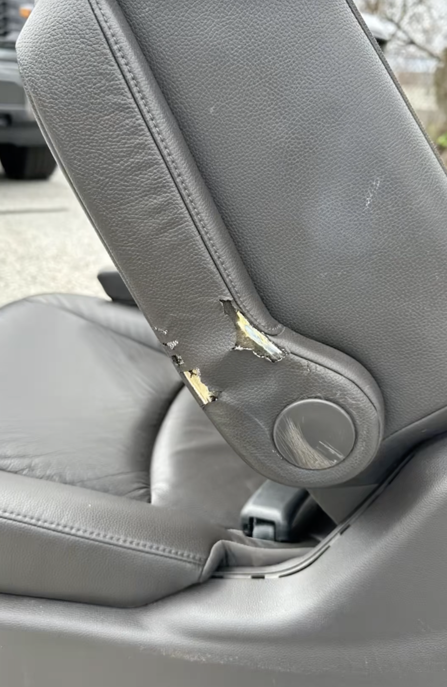 Peeling vinyl armrest before auto upholstery repair in York PA