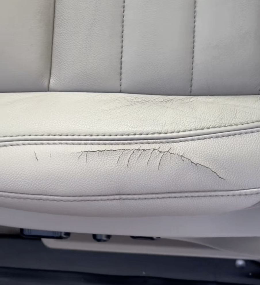 Cracked leather seat before car upholstery repair in York PA