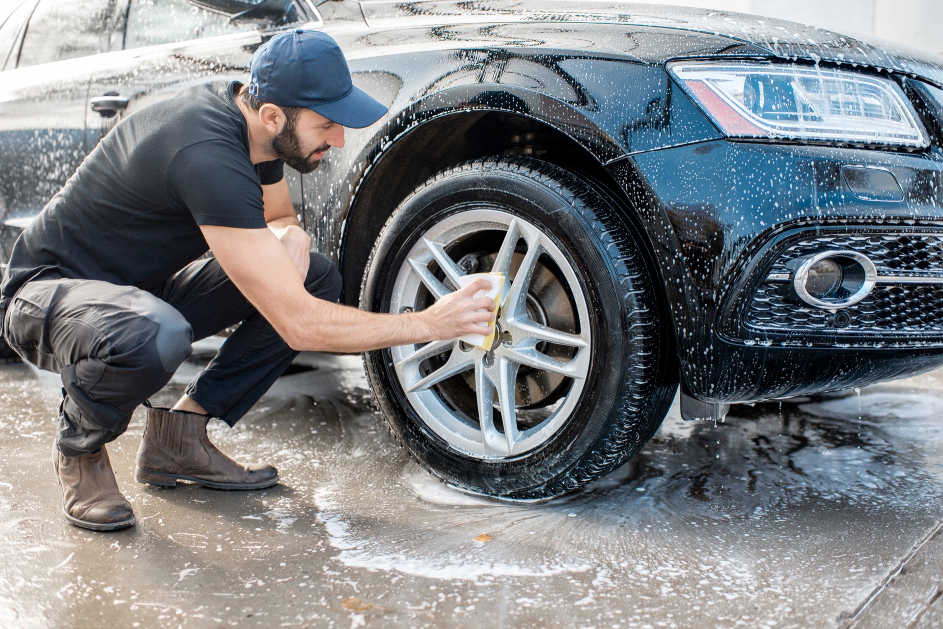 Technician cleaning an alloy rim during wheel repair in York PA